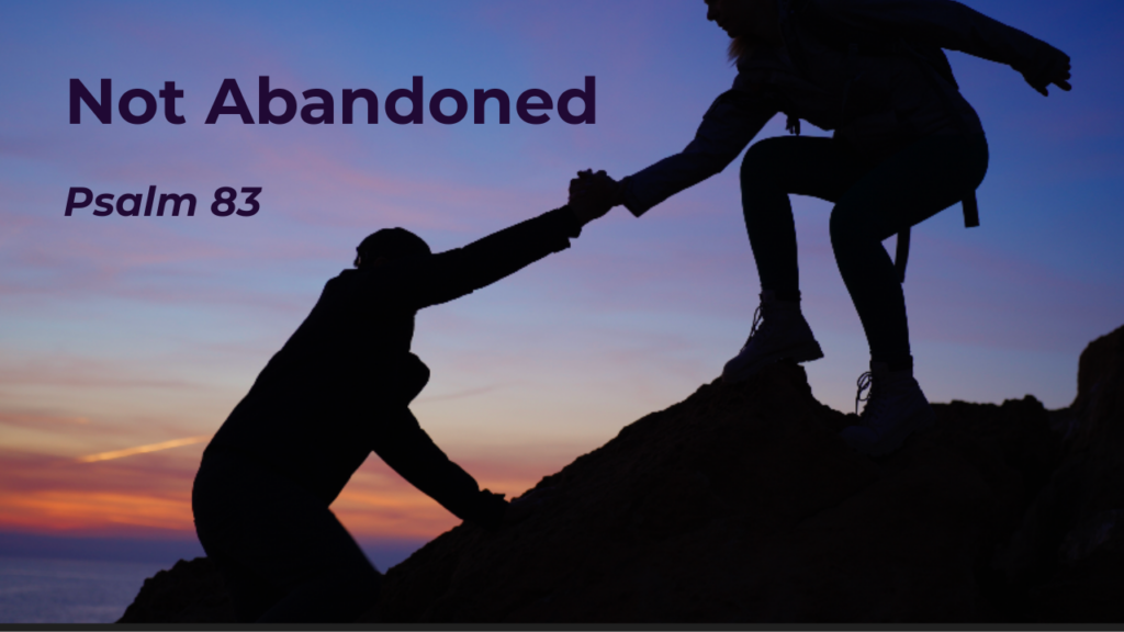 Climber helping another climber up a steep rock with the text "Not Abandoned - Psalm 83"